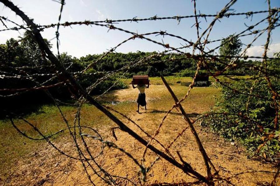 A Rohingya man carrying his belongings approaches the Bangladesh-Myanmar border in Bandarban, an area under Cox's Bazar authority on August last. - Reuters