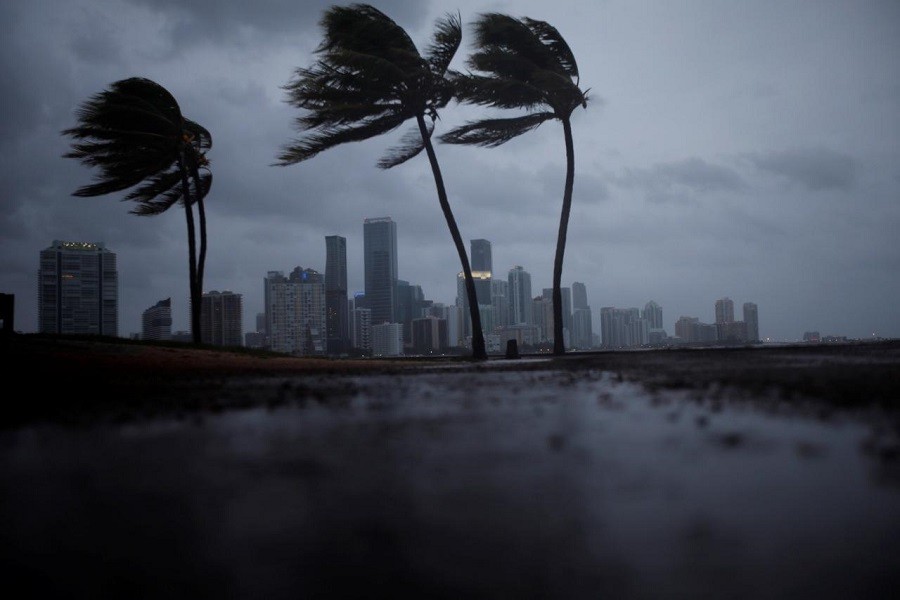 Dark clouds are seen over Miami's skyline before the arrival of Hurricane Irma to south Florida, US September 9, 2017. Reuters