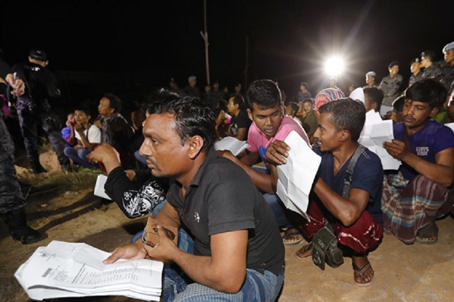 Photo collected from internet showing Bangladeshis squatting in Malaysia has been used for representational purpose only