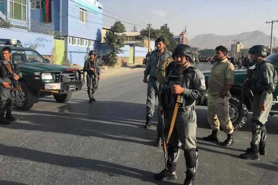 Afghan security police stand guard near the site of a deadly suicide attack outside a cricket stadium in Kabul on September 13, 2017.  - AP photo