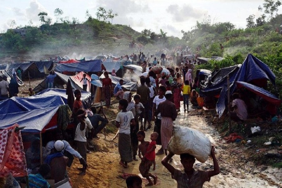 Rohingya refugees are seen at Thaingkhali makeshift refugee camp in Cox's Bazar, Bangladesh, September 14, 2017. Reuters