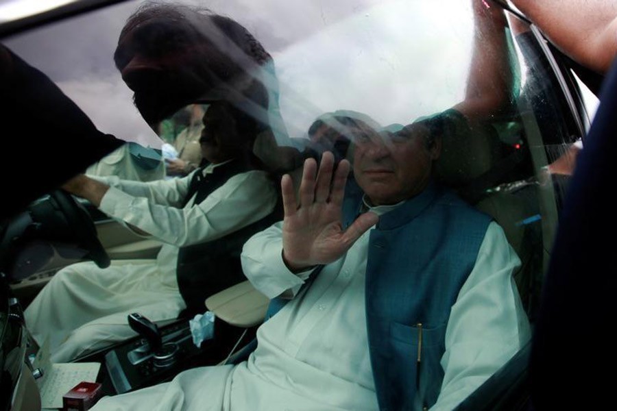 Former Pakistani Prime Minister Nawaz Sharif waves from his car after starting his journey from Rawalpindi to Lahore, Pakistan August 10, 2017. -Reuters Photo