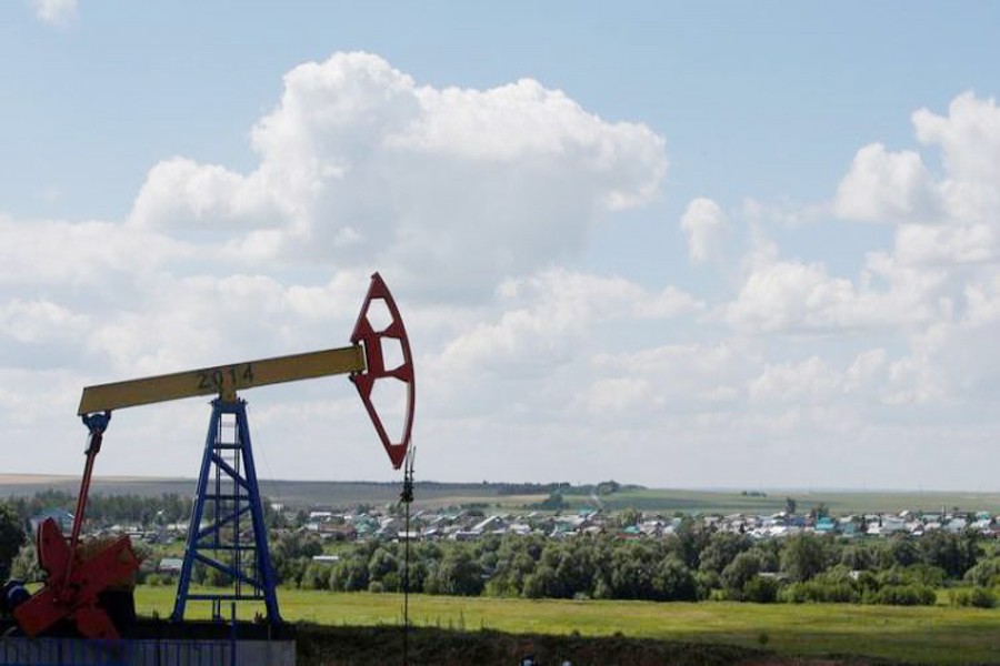 A pump jack is seen at the Ashalchinskoye oil field owned by Russia's oil producer Tatneft near Almetyevsk, in the Republic of Tatarstan, Russia. 	— Reuters