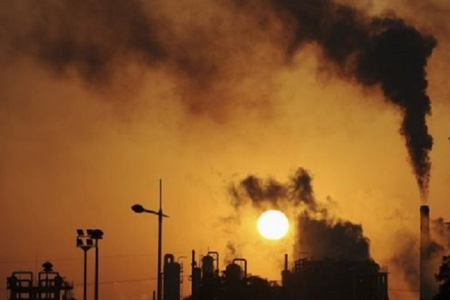 Smoke billows from chimneys at a chemical factory in Hefei, China. Photo: Reuters