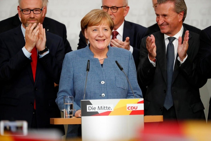 Christian Democratic Union CDU party leader and German Chancellor Angela Merkel reacts after winning the German general election (Bundestagswahl) in Berlin, Germany, September 24, 2017. Reuters