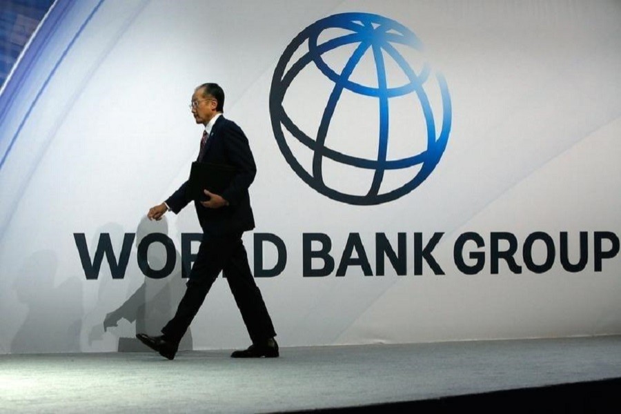 World Bank President Jim Yong Kim takes to the stage to deliver remarks at the plenary session at the IMF-World Bank annual meetings at Constitution Hall in Washington October 10, 2014. Reuters