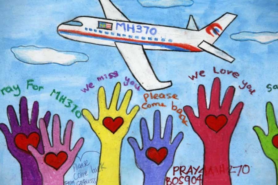 An artwork conveying well-wishes for the passengers and crew of the missing Malaysia Airlines Flight 370 at a gallery in Kuala Lumpur International Airport.  - Edgar Su/Reuters