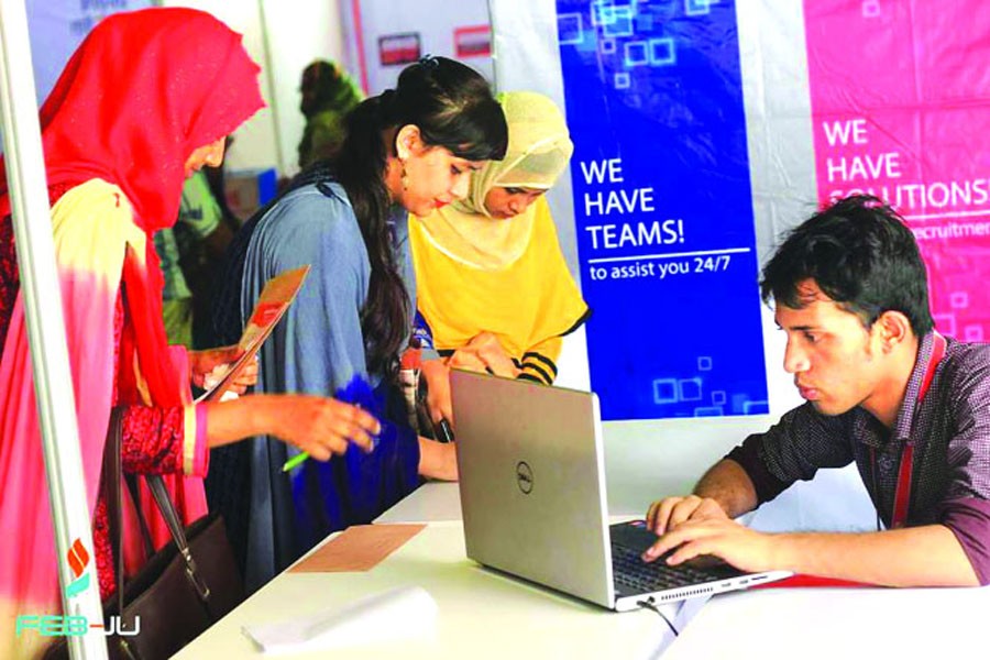 Students queue up for registration for Prodex 2017, a national business competition, at  the  Jahangirnagar University campus.