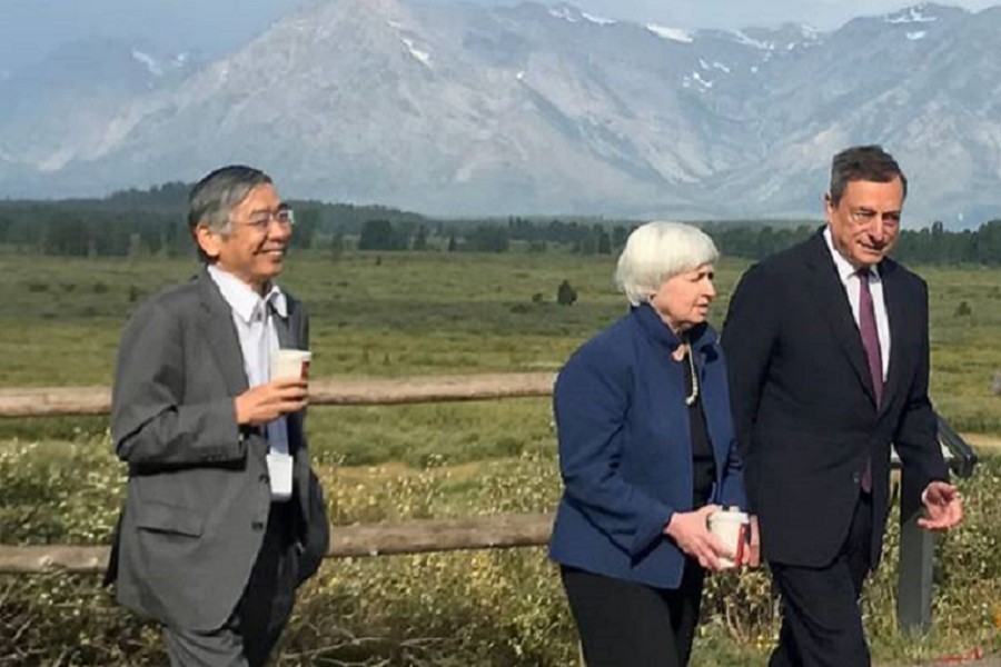 Heads of Japan, United States and Europe central banks walk after posing for a photo opportunity during the annual central bank research conference in Jackson Hole. Reuters/Files