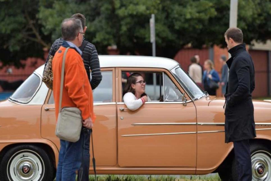 A Holden car fan sits in her car outside the Holden motor vehicle plant in Elizabeth, Australia, October 20, 2017 as their last Commodore vehicle officially rolls off the production line on Friday.  - Reuters photo