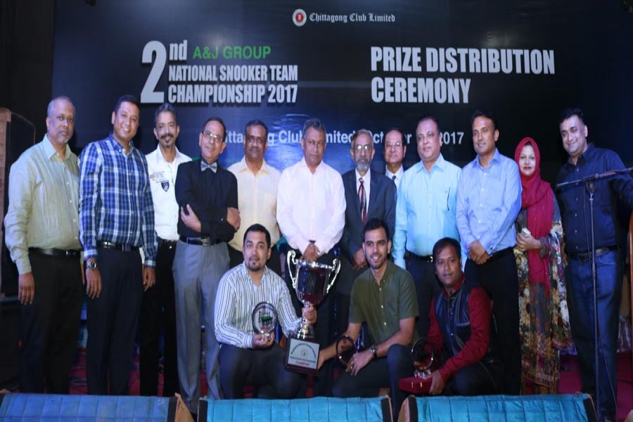 Chairman of A & J Group Ekramul Karim Chowdhury, MP, handing over prizes to the champions and runners-up of the Chittagong Club A & J National Snooker Championship 2017 at Chittagong Club on Thursday.   	— FE photo