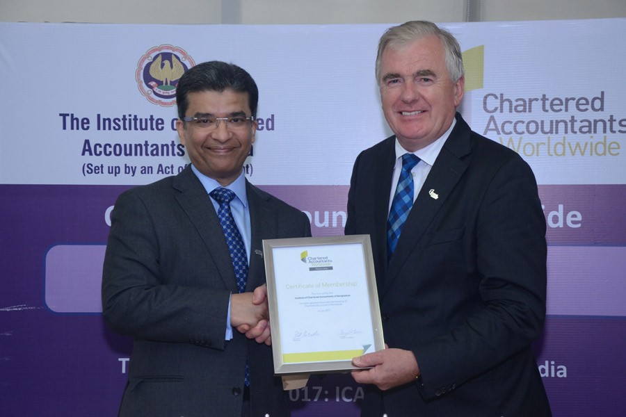 ICAB President Adeeb Hossain Khan FCA receives membership certificate from Chartered Accountants Worldwide (CAW) Chairman Pat Costello at an event in Mumbai of India recently