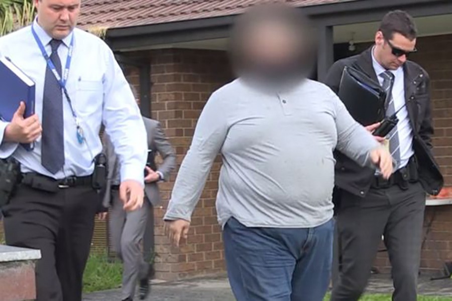 Police initially released blurred images of the man after his arrest on Tuesday. - Victoria police