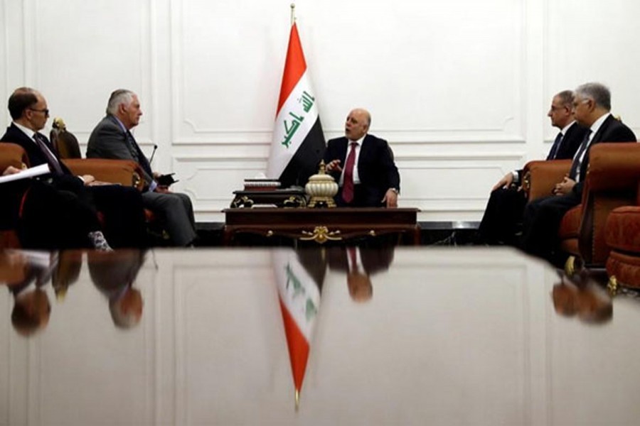 US Secretary of State Rex Tillerson (2-l) listens as Iraqi Prime Minister Haider al-Abadi (c) speaks during their meeting in baghdad on october 23, 2017. Photo: Reuters