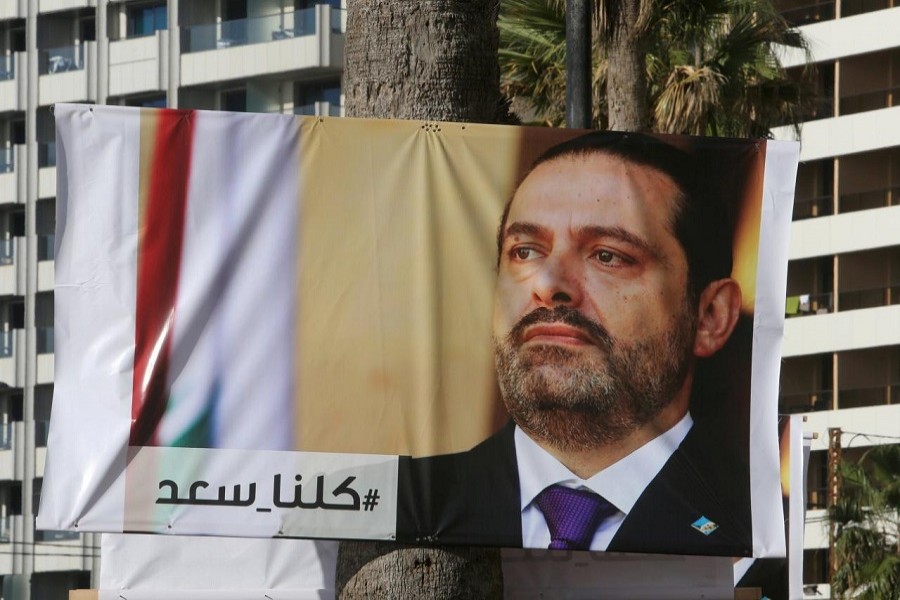 A poster depicting Lebanon's Prime Minister Saad al-Hariri, who has resigned from his post, is seen in Beirut, Lebanon, November 10, 2017. Reuters