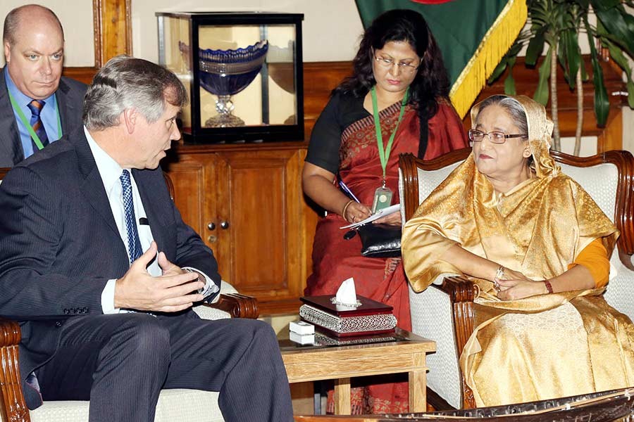 A delegation of US Senators, led by Senator Jeff Markley, makes a courtesy call with Prime Minister Sheikh Hasina at Ganabhaban in Dhaka on Sunday. -Focus Bangla Photo