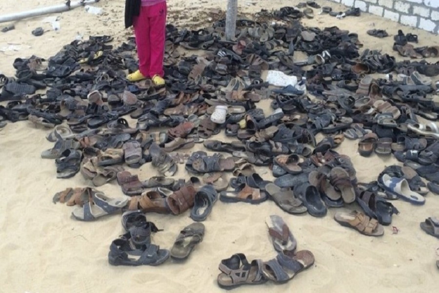 Discarded shoes of victims remain outside Al-Rawda Mosque in Bir al-Abd northern Sinai, Egypt, a day after attackers killed hundreds of worshippers, on Saturday, November 25, 2017. Photo: AP