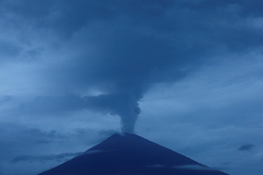 Mount Agung volcano spews smoke and ash in the early morning as seen from Amed, Karangasem Regency, Bali, Indonesia, November 30, 2017. Reuters