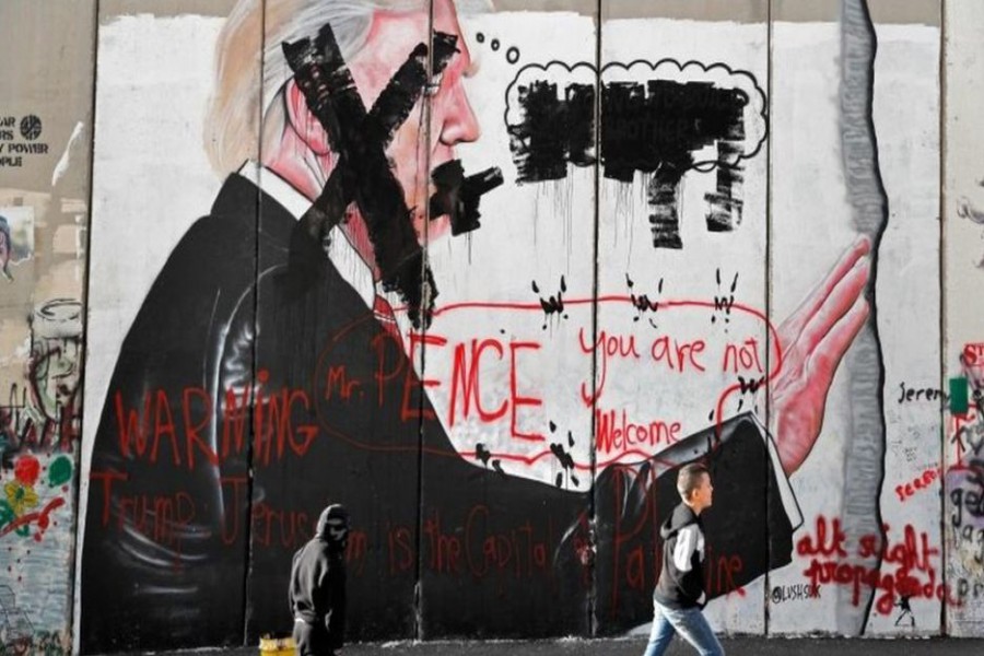 BETHLEHEM: "Pence you are not welcome", says graffiti in the West Bank city of Bethlehem.— AFP