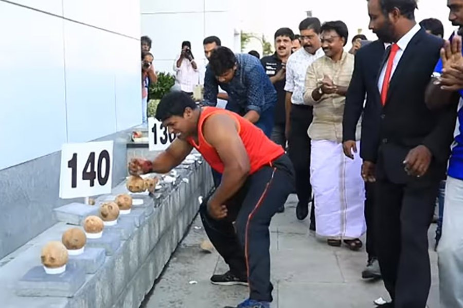 Indian man smashes 122 coconuts in a minute