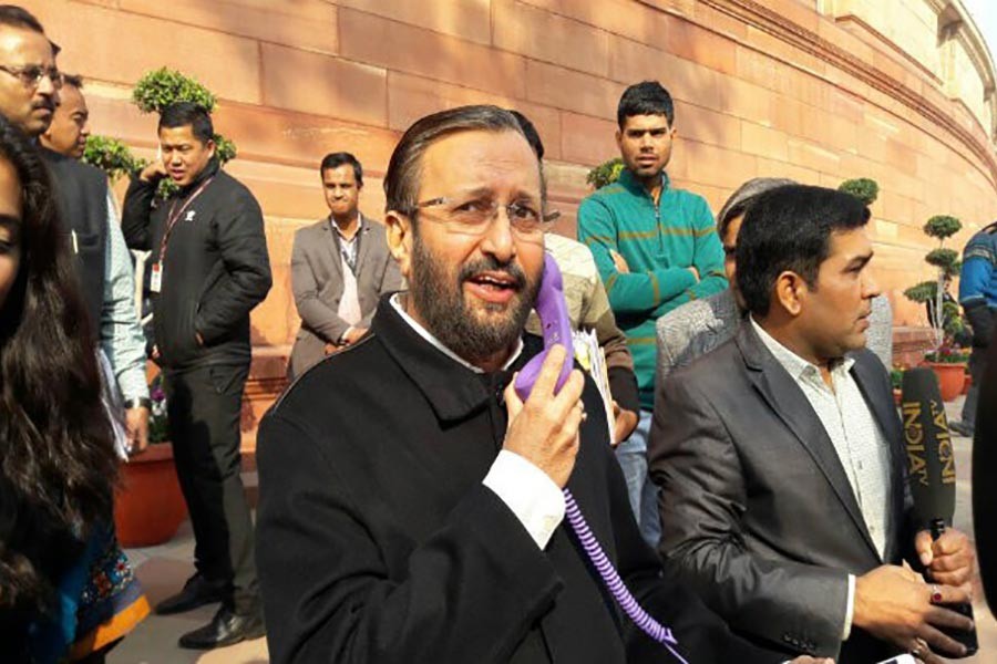 Why Indian minister carrying telephone in Parliament?