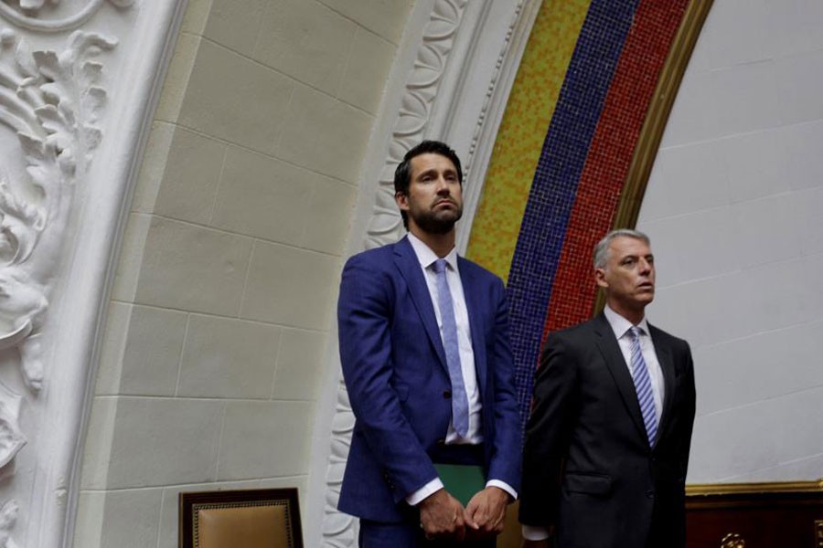 Craig Kowalik (L), political advisor to the embassy of Canada and Eduardo Porretti Charge d'Affaires of the embassy of Argentina attend a session of Venezuela's opposition-controlled National Assembly in Caracas, Venezuela, August 2, 2017. (REUTERS)