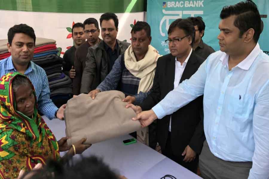 BRAC Bank distributes blankets among cold-hit people