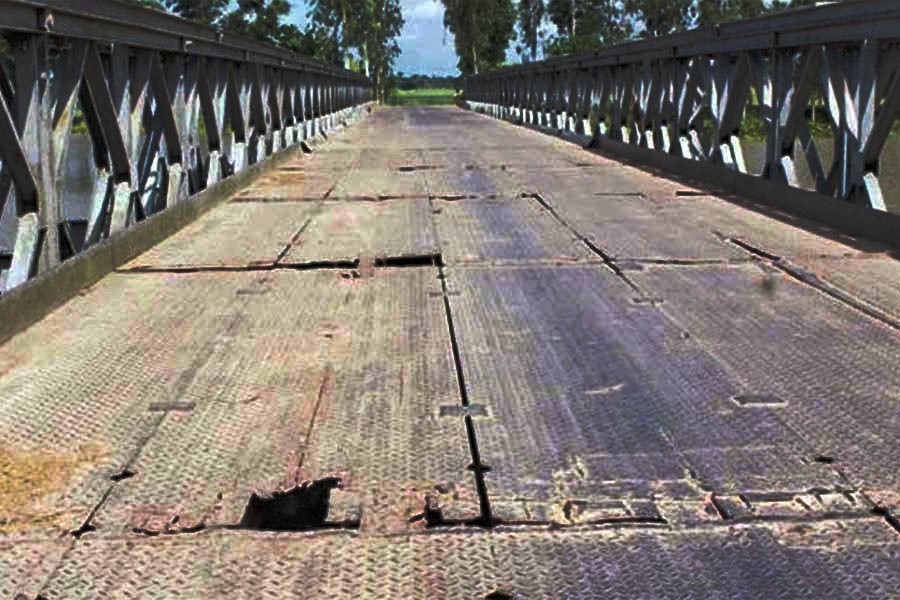 A broken view of steel bridge over Raktadah Beel at Adamdighi upazila of Bogra. -FE Photo