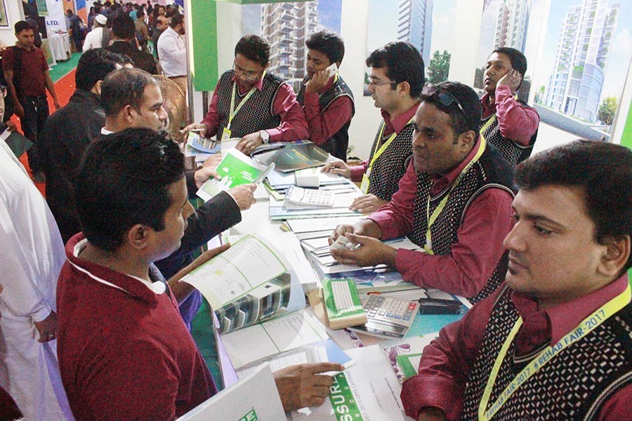 Visitors on Monday throng the REHAB 2017 fair on its last day at the Bangabandhu International Conference Centre in the city. - Focus Bangla photo