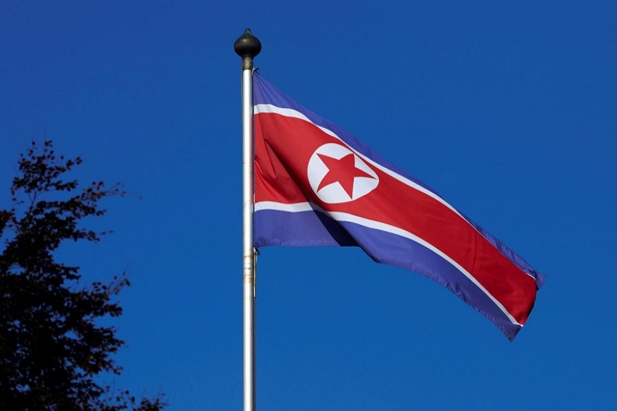 A North Korean flag flies on a mast at the Permanent Mission of North Korea in Geneva October 2, 2014. Reuters/File Photo