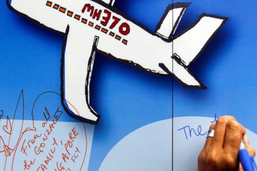 In this file photo, well wishes are written on a wall during a remembrance event for the ill-fated Malaysia Airlines Flight 370 in Kuala Lumpur, Malaysia.  – AP photo