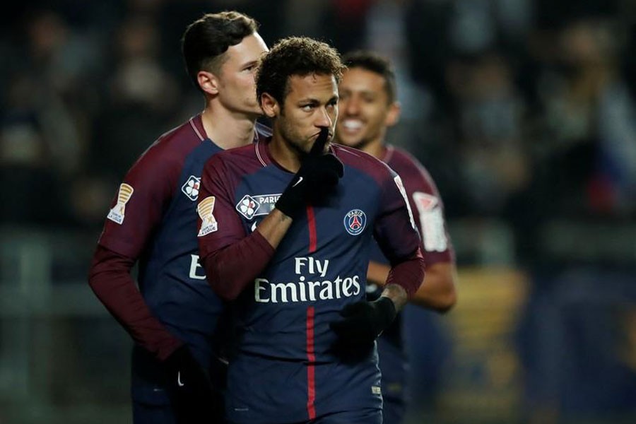 Paris Saint-Germain’s Neymar celebrates scoring their first goal from the penalty spot with Julian Draxler. (REUTERS)