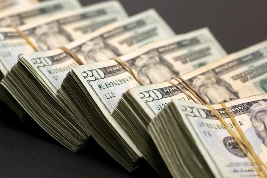 Bundles of banknotes of US Dollar are pictured at a currency exchange shop in Ciudad Juarez, Mexico. 	— Reuters