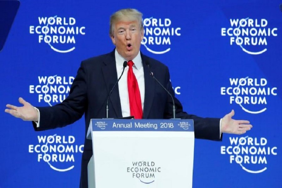 President Donald Trump gestures as he delivers a speech during the World Economic Forum annual meeting in Davos, Switzerland January 26, 2018. Reuters