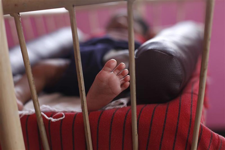 A baby girl is seen lying in a cradle inside the Life Line Trust orphanage in Salem in the southern Indian state of Tamil Nadu June 20, 2013. - Reuters file photo used for representation.