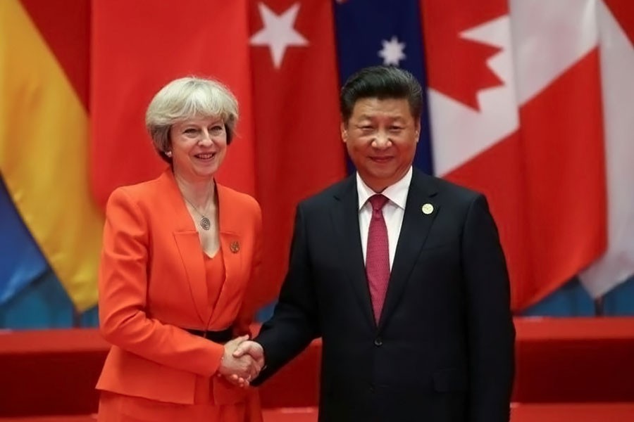 Chinese President Xi Jinping shakes hands with Britain's Prime Minister Theresa May during the G20 Summit in Hangzhou, Zhejiang province, China September 4, 2016. (REUTERS)