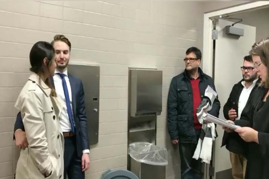 Couple exchange vows in bathroom