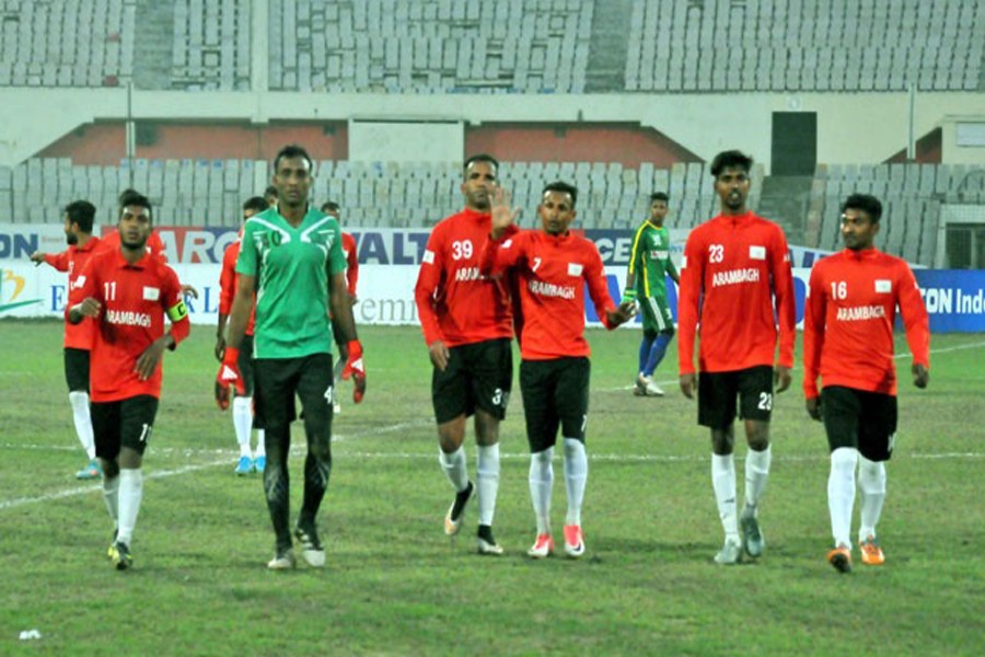 Footballers of Arambagh Krira Sangha celebrate after reaching final of the Independence Cup Football Tournament at the Bangabandhu National Stadium in the city on Monday.	— bdnews24.com