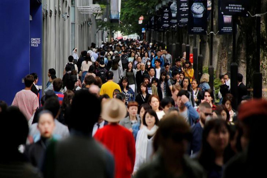 People walk in Omotesando shopping district in Tokyo, Japan May 17, 2017. Reuters/File Photo