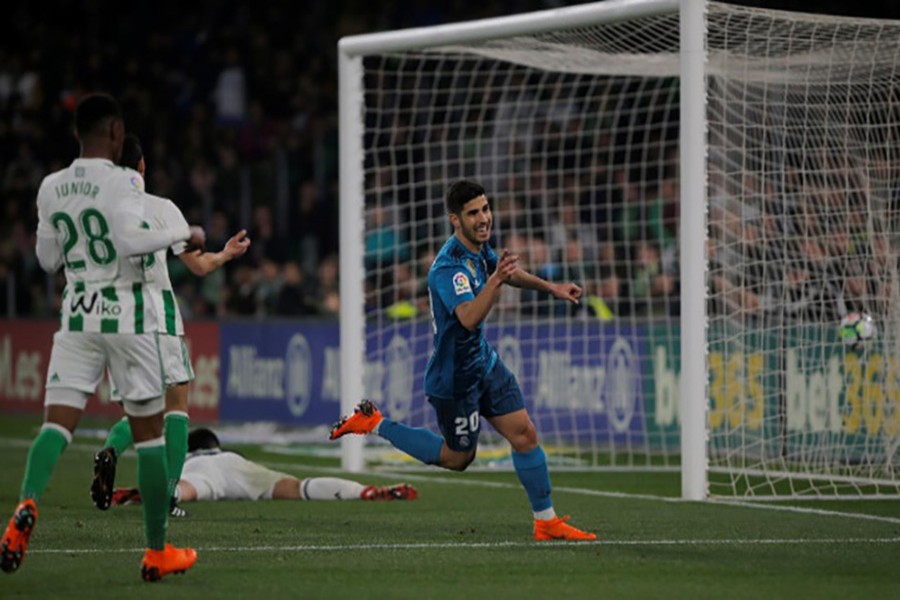 Asensio celebrates scoring his second goal against Betis. - Reuters photo