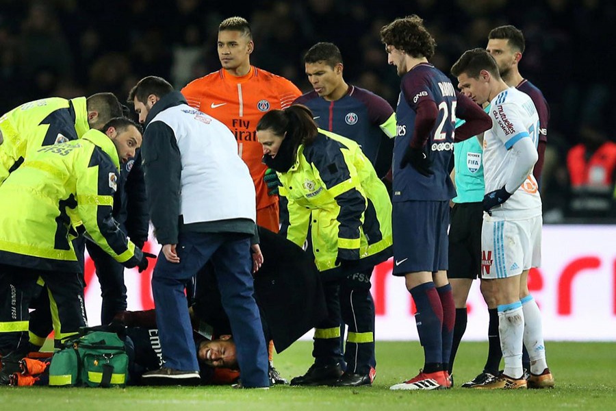 Paris Saint-Germain’s Neymar is put onto a stretcher by medical staff after sustaining an injury in clash against Marseille. - Reuters photo