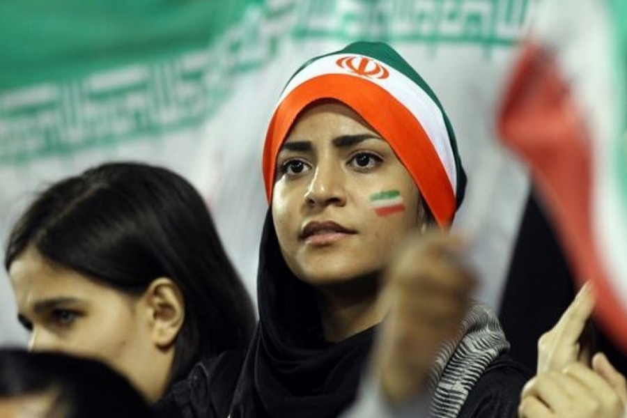 Iranian young woman fans watch their team winning during their 2014 World Cup Asian zone qualifying football match between Qatar and Iran at the Al-Sadd stadium in Doha on, Tuesday on June, 4, 2013. - AP file photo used only for representation.