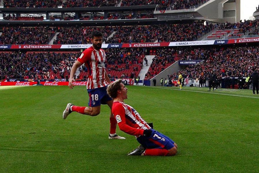 La Liga Santander - Atletico Madrid vs Celta Vigo - Wanda Metropolitano, Madrid, Spain - March 11, 2018 Atletico Madrid’s Antoine Griezmann celebrates scoring their first goal with Diego Costa. Reuters.