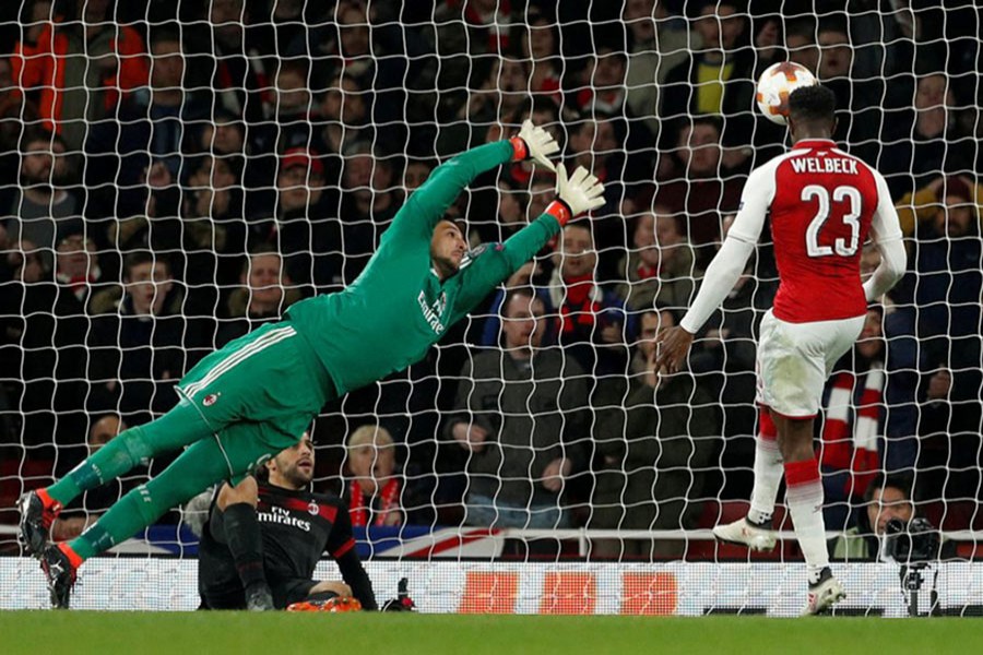 Arsenal's Danny Welbeck scores their third goal during clash against AC Milan on Thursday Action Images/Reuters