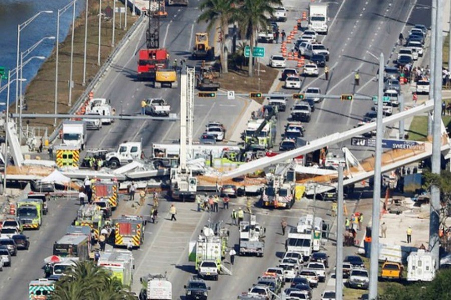 Aerial view shows a pedestrian bridge collapsed at Florida International University in Miami, Florida, US, March 15, 2018. Reuters/Files