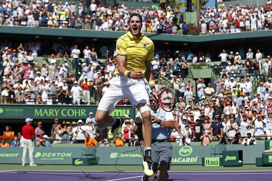 John Isner of the United States celebrates after his match against Alexander Zverev of Germany (not pictured) in the men's singles final of the Miami Open on Monday - Reuters photo