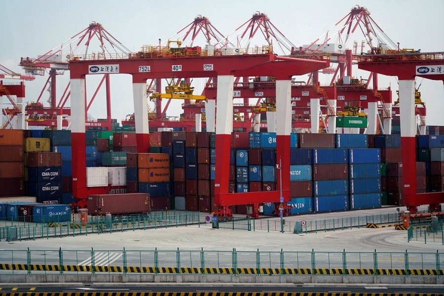 Containers are seen at the Yangshan Deep Water Port, part of the Shanghai Free Trade Zone, in Shanghai, China March 14, 2018. Reuters/Files