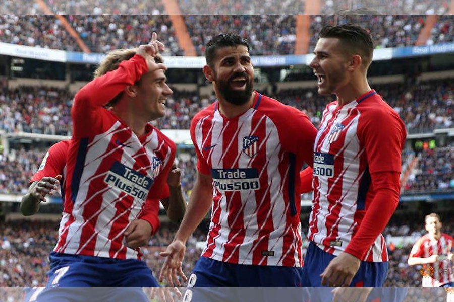 La Liga Santander - Real Madrid vs Atletico Madrid - Santiago Bernabeu, Madrid, Spain - April 8, 2018 Atletico Madrid’s Antoine Griezmann celebrates scoring their first goal with Diego Costa. Reuters.