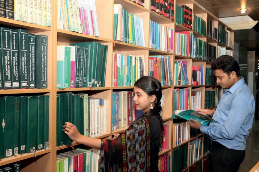 Students browsing books at the library of the Institute of Chartered Accountants of Bangladesh (ICAB)