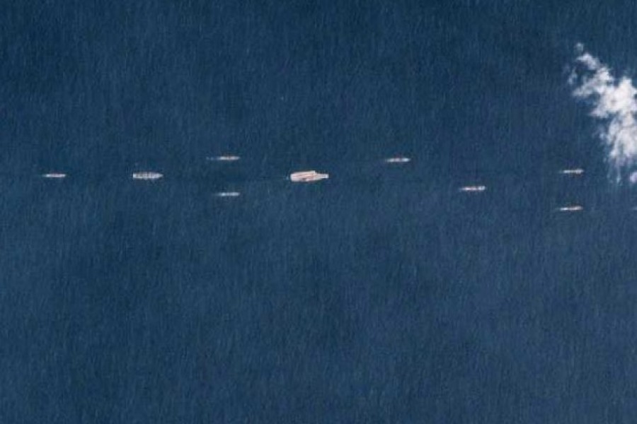 The picture taken by Planet Labs Inc., appears to show the Liaoning carrier at the centre of a formation.  - ndtv.com